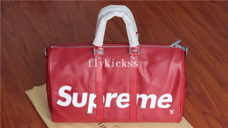 Supreme LVS Traveling Red Duffle Bag